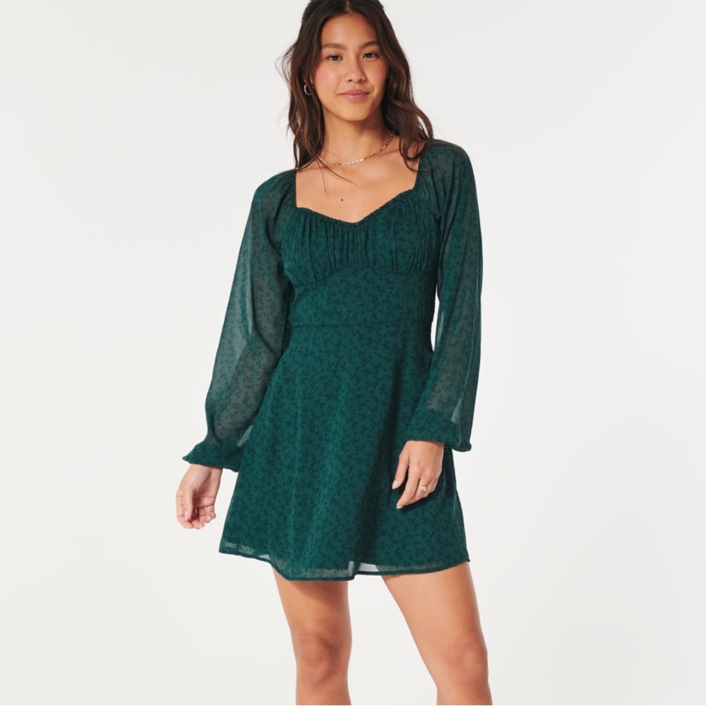 Hollister blue patterned long sleeve dress with square neckline.  Sheer sleeves
